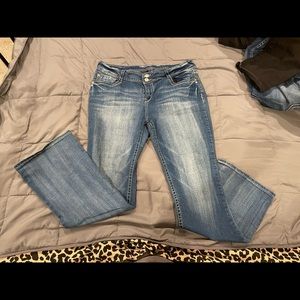 Distressed blue jeans